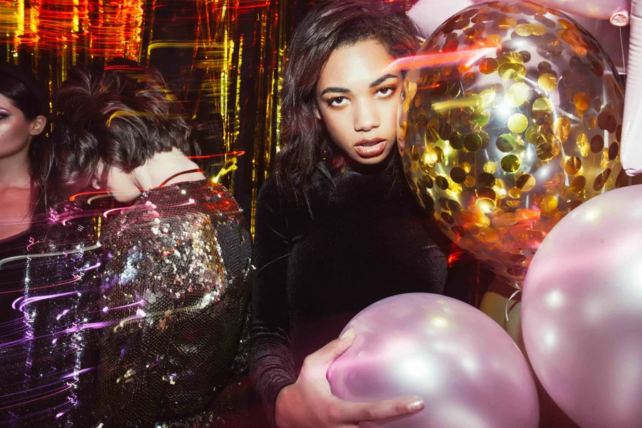 Disco balls and a richly colored party atmosphere